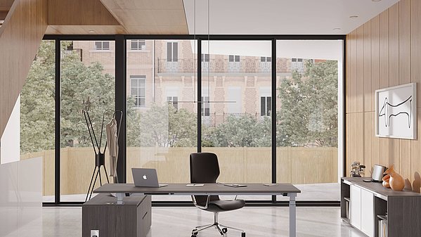 Höhenverstellbarer Schreibtisch im Home Office, kombiniert mit funktionalen Büromöbeln für flexibles Arbeiten.